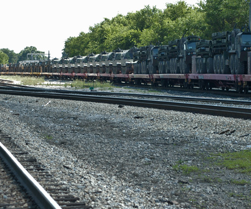 Lots of tanks on a train.